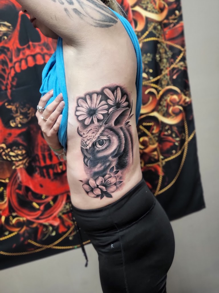 Tattoo work by Outlaw Art Gallery and Tattoos (2)