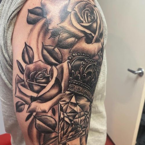 Rose & Dagger Tattoo in Houston