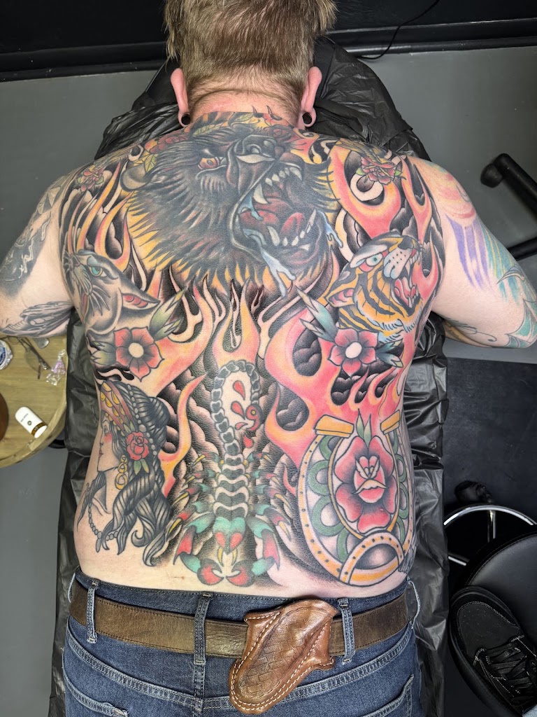 Tattoo work by Solid Black Ink Tattoo Parlor (1)