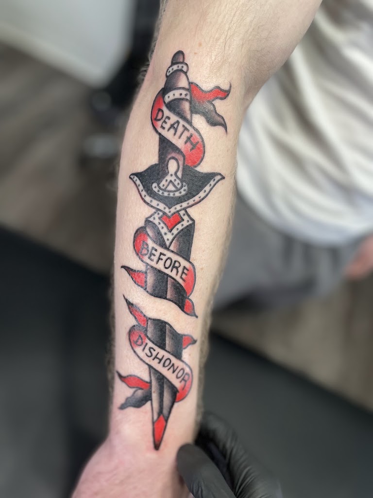 Tattoo work by Solid Black Ink Tattoo Parlor (2)