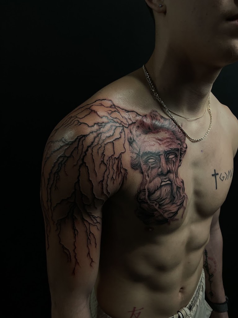 Tattoo work by Visionary ink and Barbershop (1)