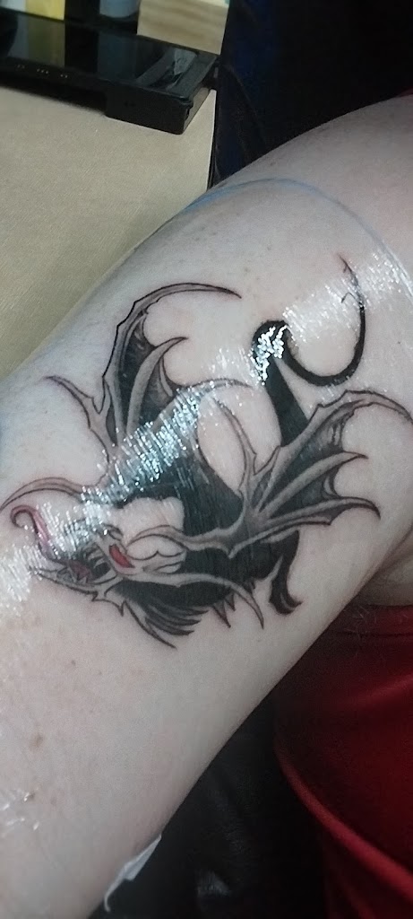 Tattoo work by Visionary ink and Barbershop (2)