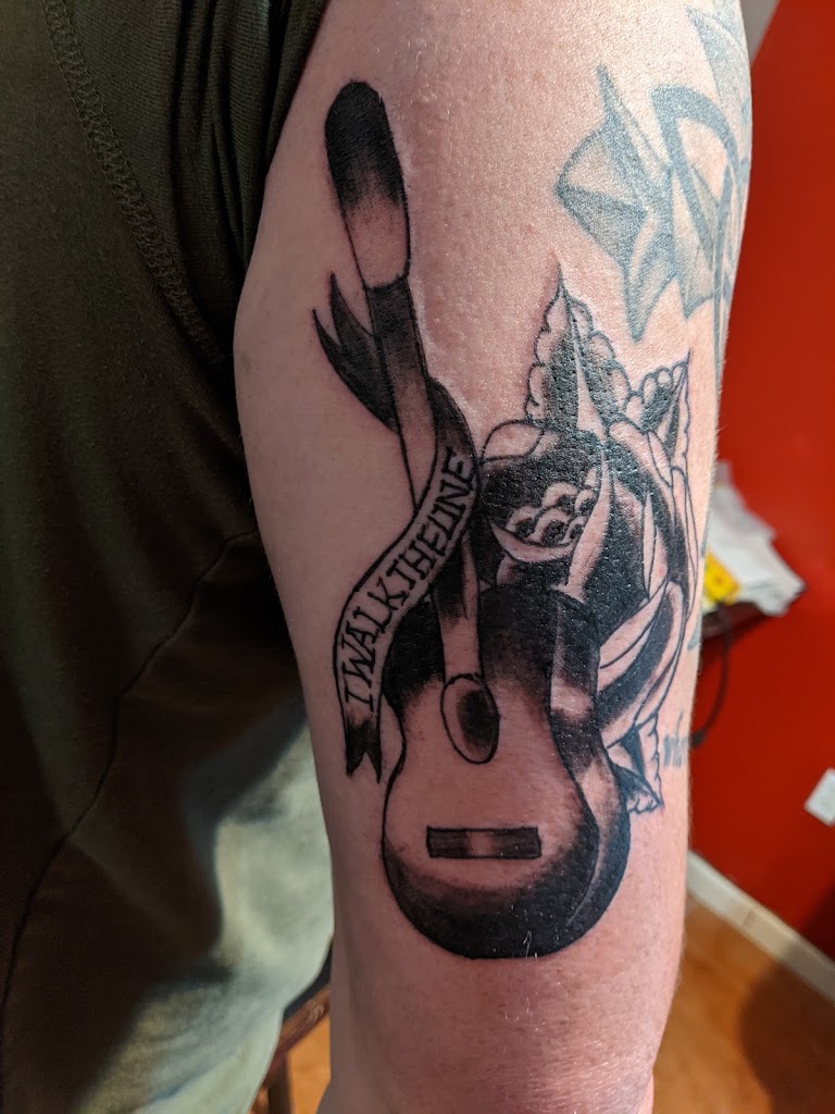Tattoo work by Vudoo Tattoo and Body Piercing (5)