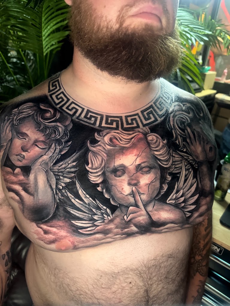 Tattoo work by Xquizitskillz Tattoo & JA's BARBERSHOP (2)